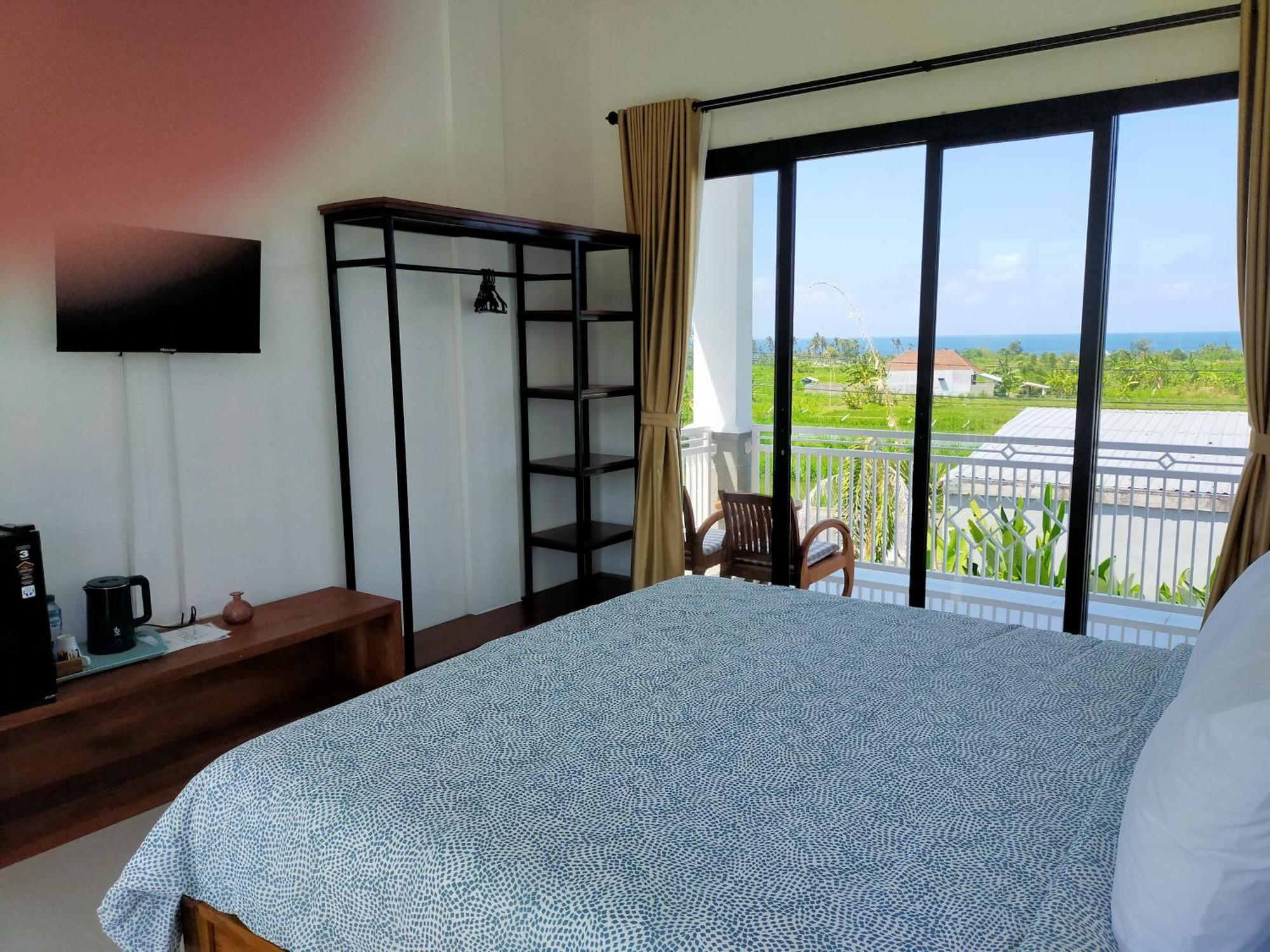 Limun Guesthouse Amlapura Номер фото